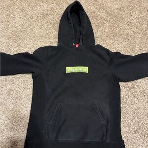 Supreme Black Hoodie with Yellow Patch